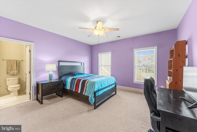 20069 Forest Farm Ln, Ashburn, VA 20147 - bedroom with baseboards, ensuite bathroom, ceiling fan, visible vents, and light colored carpet