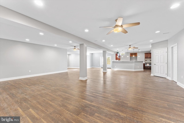 20069 Forest Farm Ln, Ashburn, VA 20147 - unfurnished living room with baseboards, recessed lighting, dark wood finished floors, and ceiling fan