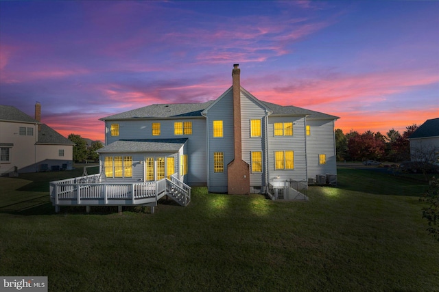 20069 Forest Farm Ln, Ashburn, VA 20147 - back of property featuring a yard, a chimney, a wooden deck, and central AC unit