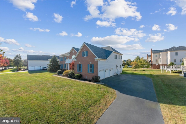 20069 Forest Farm Ln, Ashburn, VA 20147 - view of home's exterior featuring an attached garage, brick siding, driveway, and a lawn
