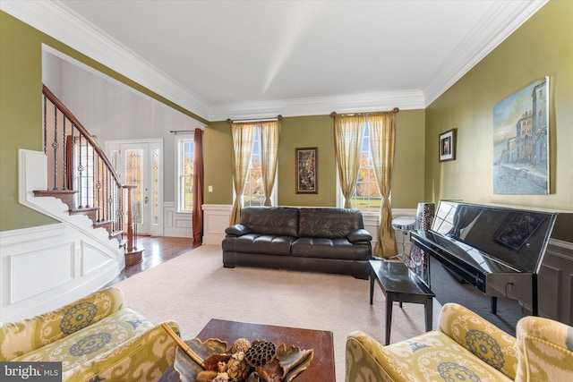 20069 Forest Farm Ln, Ashburn, VA 20147 - living area featuring ornamental molding, stairs, a decorative wall, and plenty of natural light