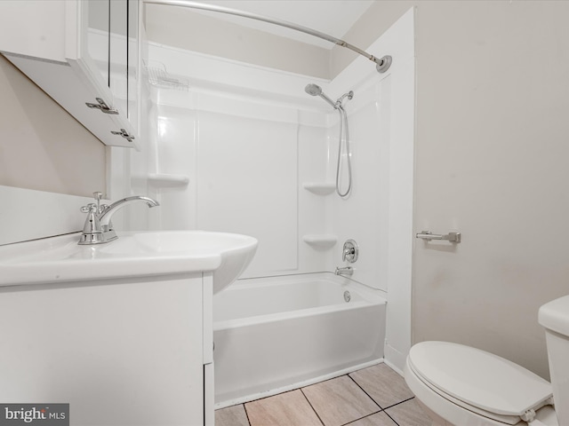 full bathroom featuring vanity, toilet, shower / bath combination, and tile patterned floors