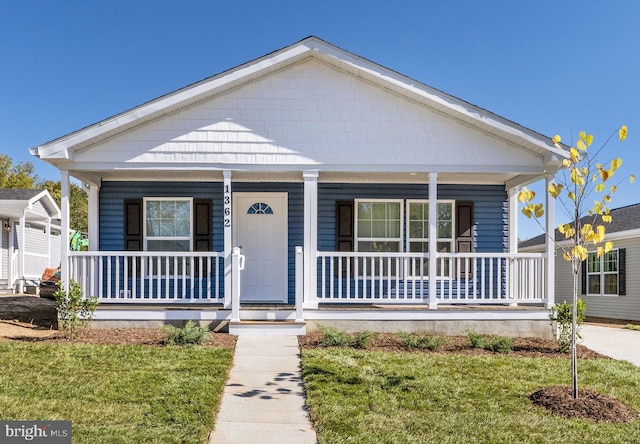 1362 Connecticut Ave, Hagerstown, MD 21740 - view of front of house featuring covered porch and a front yard