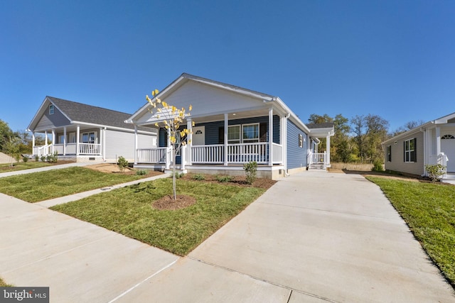 1362 Connecticut Ave, Hagerstown, MD 21740 - view of front of property with covered porch, driveway, and a front yard