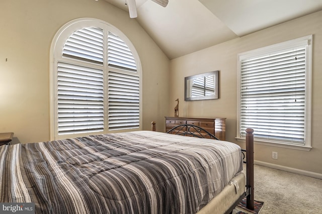 carpeted bedroom with vaulted ceiling