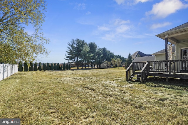 view of yard with a deck