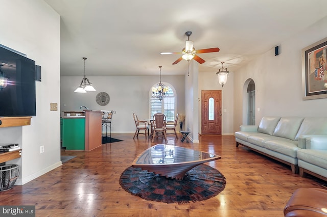 living room with hardwood / wood-style floors and ceiling fan