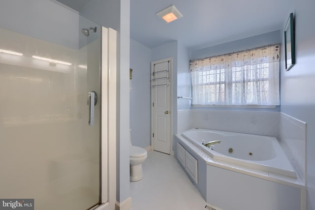 bathroom with toilet, tile patterned floors, and separate shower and tub