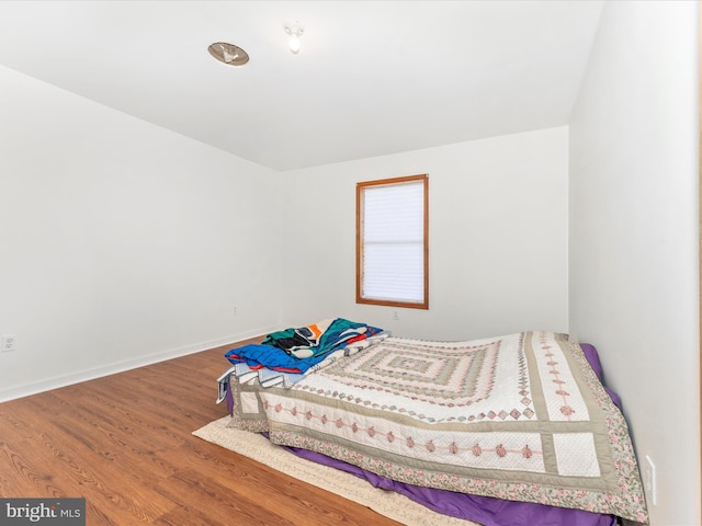 bedroom featuring hardwood / wood-style floors