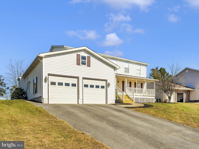 view of property with a porch and a front lawn