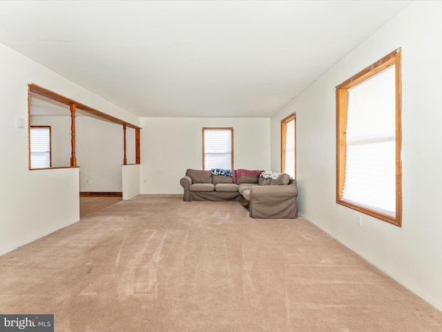 living room with light colored carpet