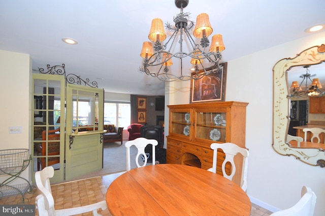 dining room featuring a chandelier