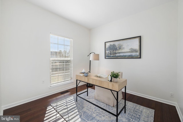 office space with hardwood / wood-style floors