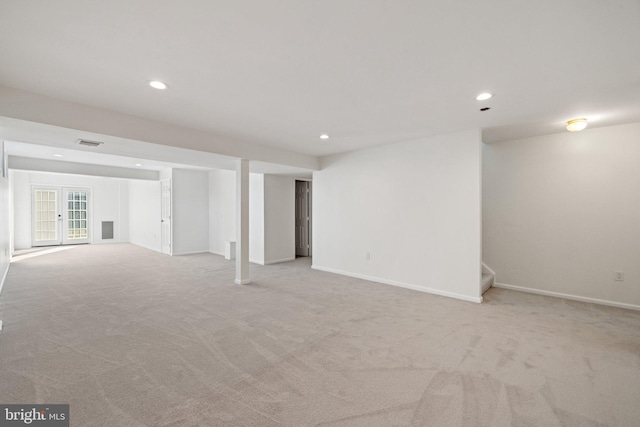 basement with light colored carpet