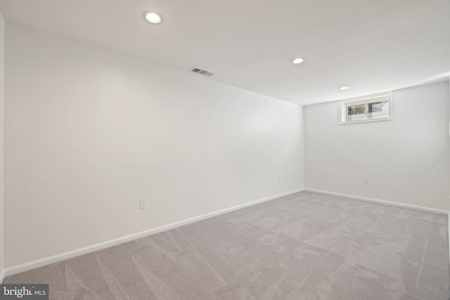 basement with light carpet