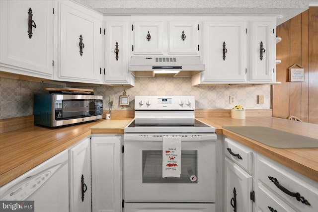 kitchen with ventilation hood, electric range, white cabinets, and tasteful backsplash