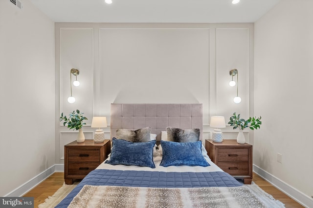 bedroom featuring light hardwood / wood-style floors