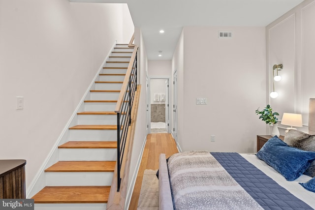 bedroom with light hardwood / wood-style flooring