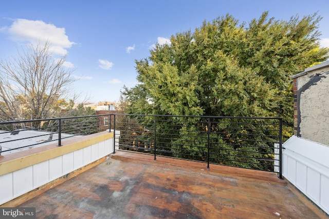 view of patio with a balcony