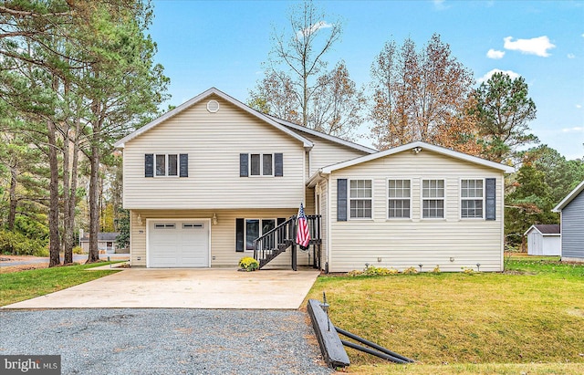 39 Admiral Ave, Ocean Pines, MD 21811 - tri-level home featuring concrete driveway, a front lawn, an attached garage, and stairs
