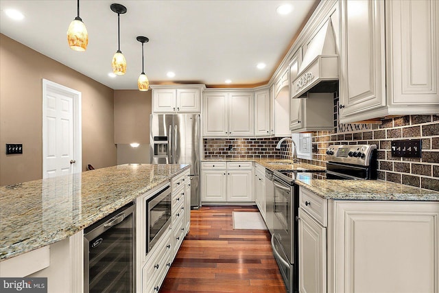 39 Admiral Ave, Ocean Pines, MD 21811 - kitchen with beverage cooler, appliances with stainless steel finishes, a sink, dark wood finished floors, and decorative backsplash