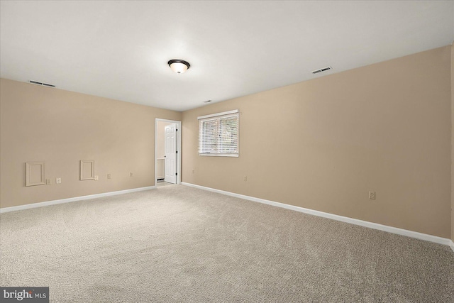 39 Admiral Ave, Ocean Pines, MD 21811 - empty room with baseboards and light colored carpet
