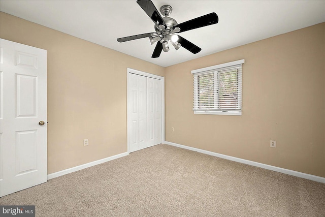 39 Admiral Ave, Ocean Pines, MD 21811 - unfurnished bedroom featuring carpet floors, a closet, baseboards, and a ceiling fan