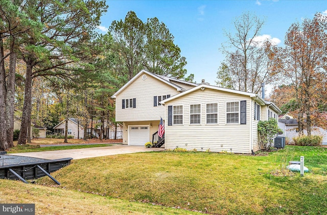 39 Admiral Ave, Ocean Pines, MD 21811 - tri-level home featuring a garage, driveway, central AC, and a front lawn