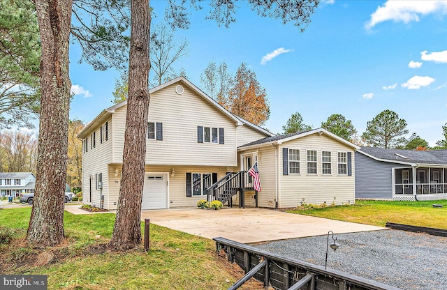 39 Admiral Ave, Ocean Pines, MD 21811 - view of front of home featuring driveway, a garage, and a front yard