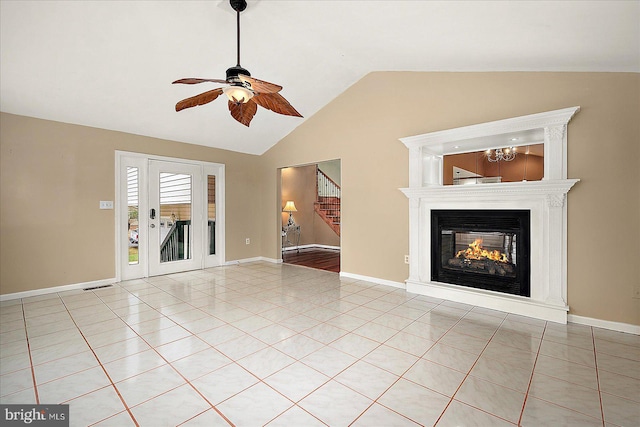 39 Admiral Ave, Ocean Pines, MD 21811 - unfurnished living room featuring a ceiling fan, stairs, a multi sided fireplace, light tile patterned flooring, and baseboards
