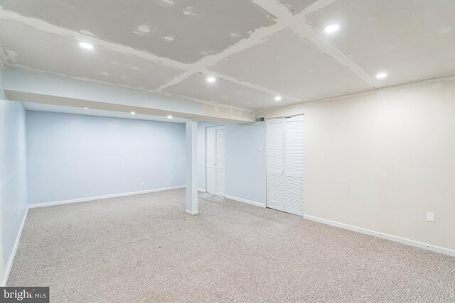 basement featuring carpet floors