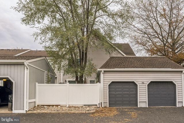 exterior space with a garage