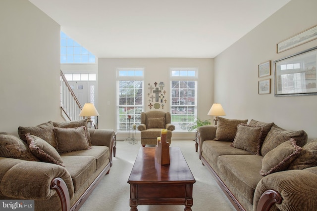 living room with light colored carpet