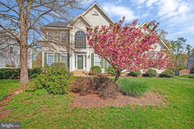 view of front facade with a front lawn