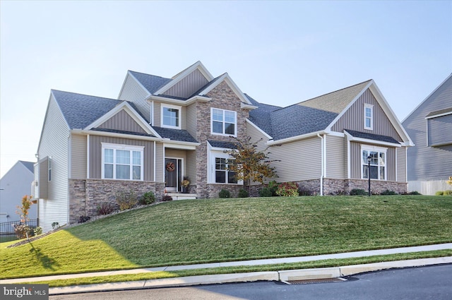 craftsman house with a front yard