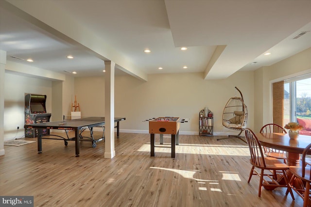 recreation room featuring light wood-type flooring