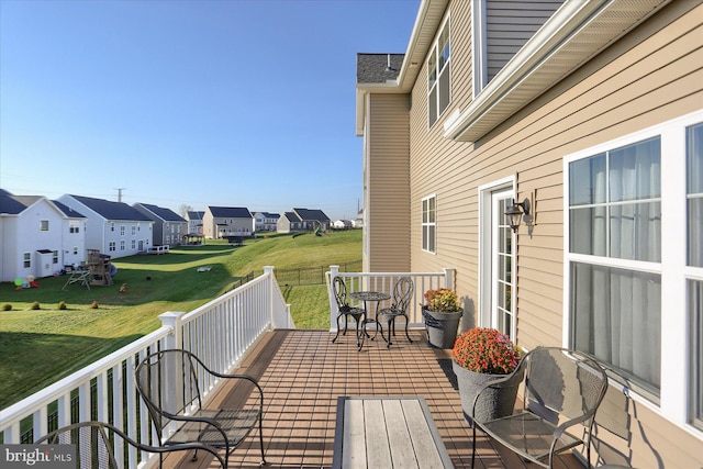 deck featuring a lawn