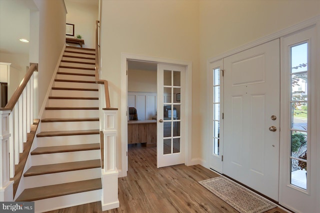 foyer with light wood-type flooring