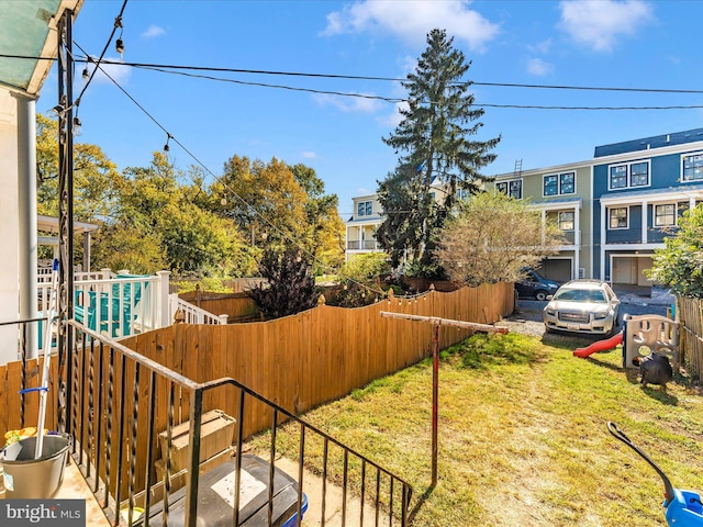 view of yard with a garage