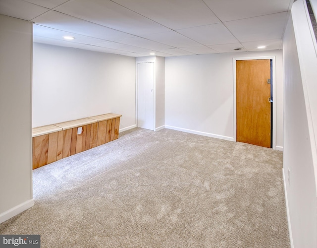 basement featuring carpet flooring