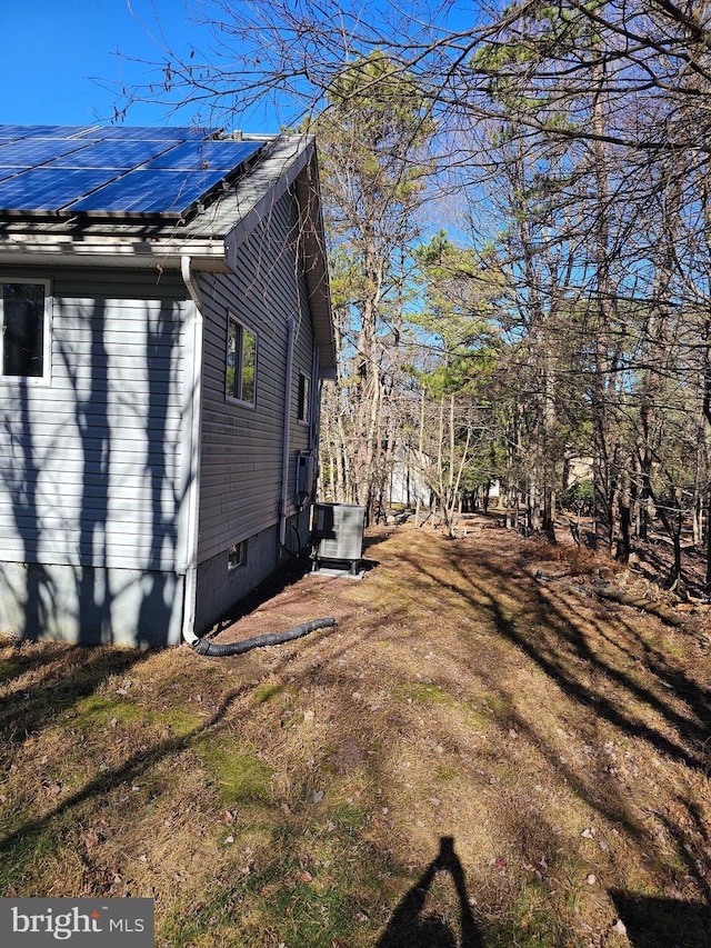 view of property exterior with cooling unit