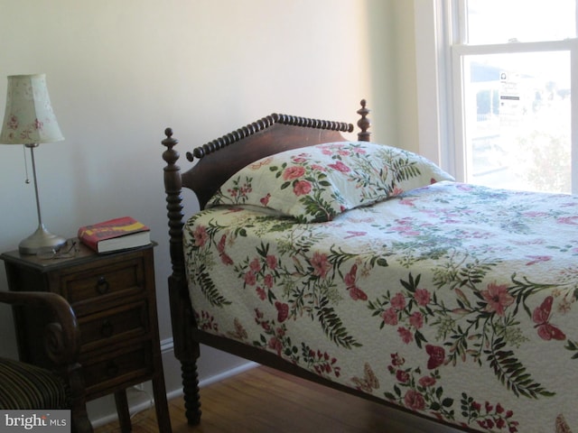 bedroom featuring hardwood / wood-style flooring