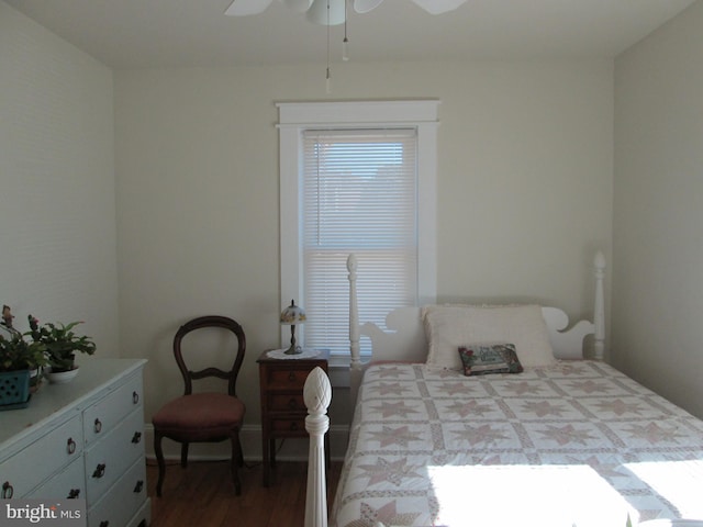 bedroom with ceiling fan and wood-type flooring