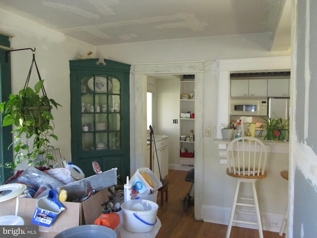 interior space with hardwood / wood-style flooring