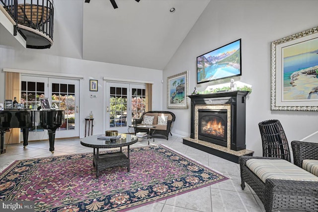 living room featuring french doors, high vaulted ceiling, and light tile patterned floors