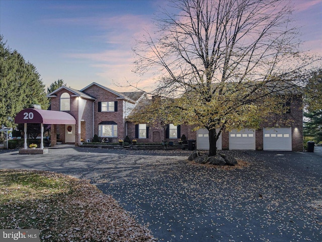 front facade with a garage