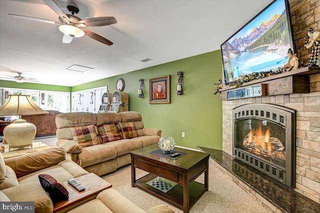 living room featuring ceiling fan and light carpet