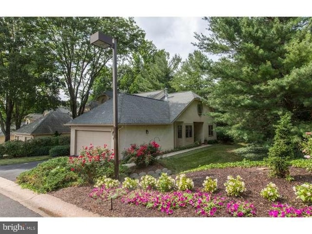 view of home's exterior with a garage