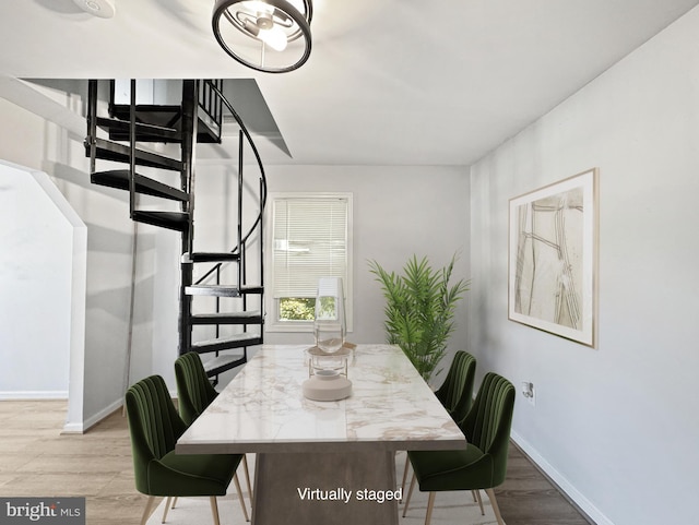 dining room with light wood-type flooring