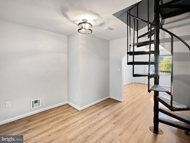 unfurnished dining area featuring light hardwood / wood-style floors